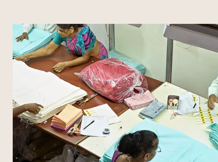 People working with textiles in a workshop